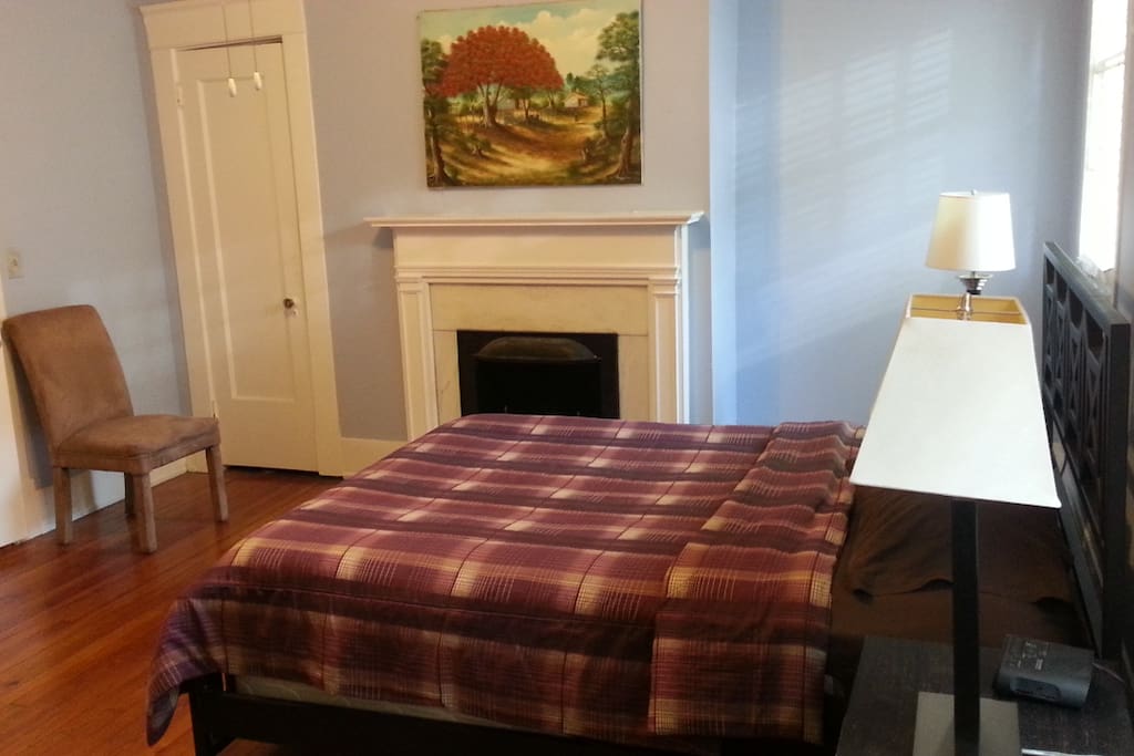 bedroom with decorative fireplace