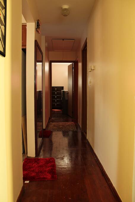 Hallway Connecting Rooms with Bathroom and Kitchen