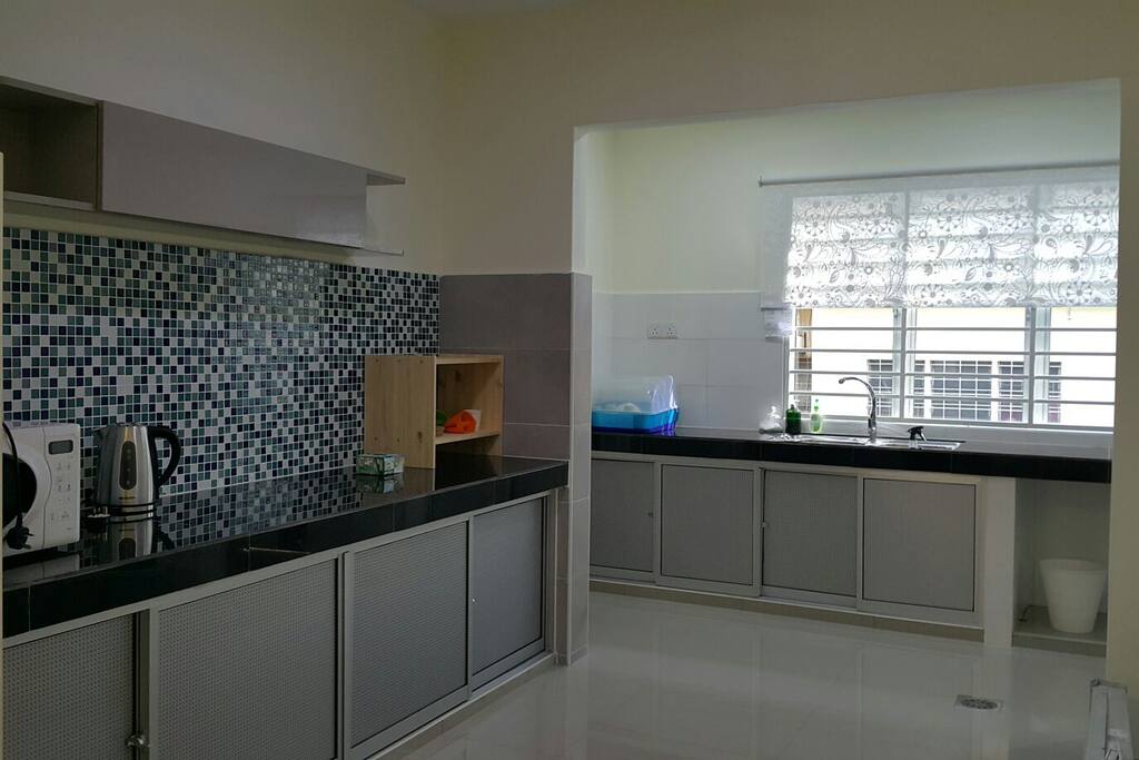 Renovated kitchen. With kitchen utensils & double wash sink
