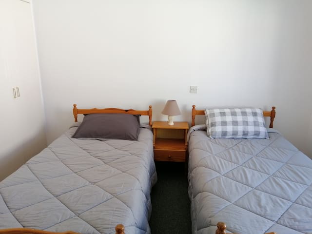 SHARED bedroom near beach/bus line to airport