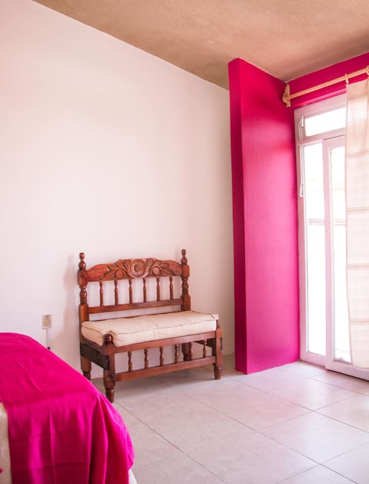 Charming room carefully decorated with handmade furniture by a local carpenter; Sheets, towels and pillows of excellent quality and blankets made by Oaxacan artisans.