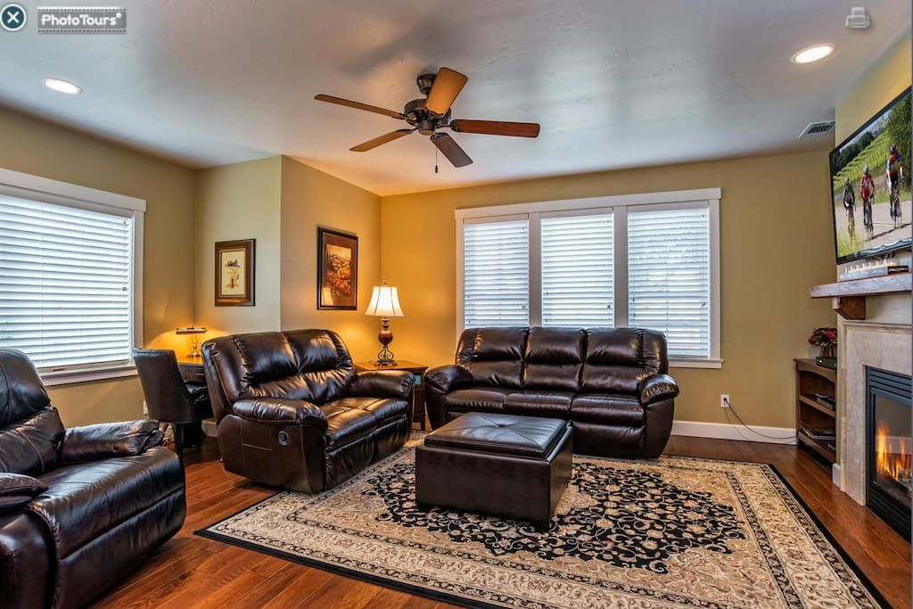 Open living room with cable TV, internet and fireplace..