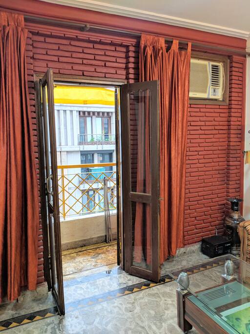 Glimpse of the small cozy balcony / terrace, overlooking our metropolitans hustle and bustle.