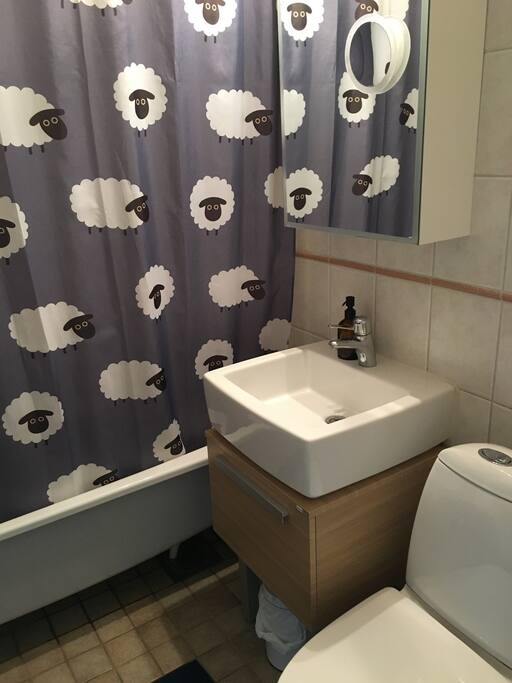 Bathroom with bathtub and shower