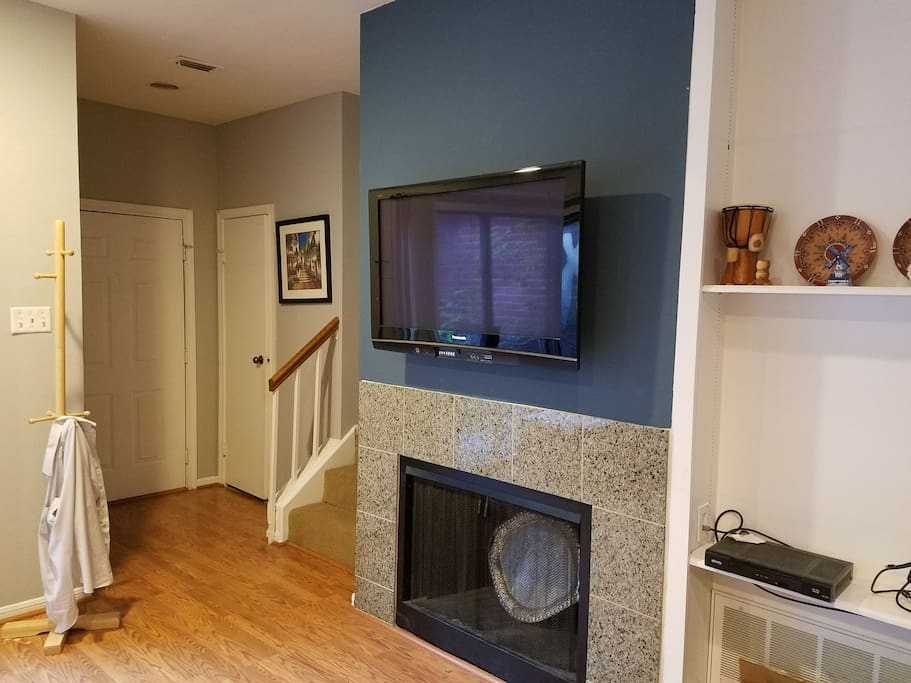 Sit down to a movie or watch the game. The fireplace works too (not that Houston allows for it much)