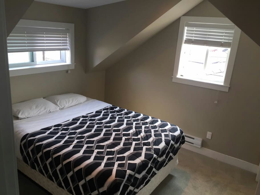 bedroom A - 1 queen bed + outdoor balcony