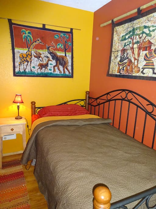 Fun twin guestroom with all-cotton bedding...