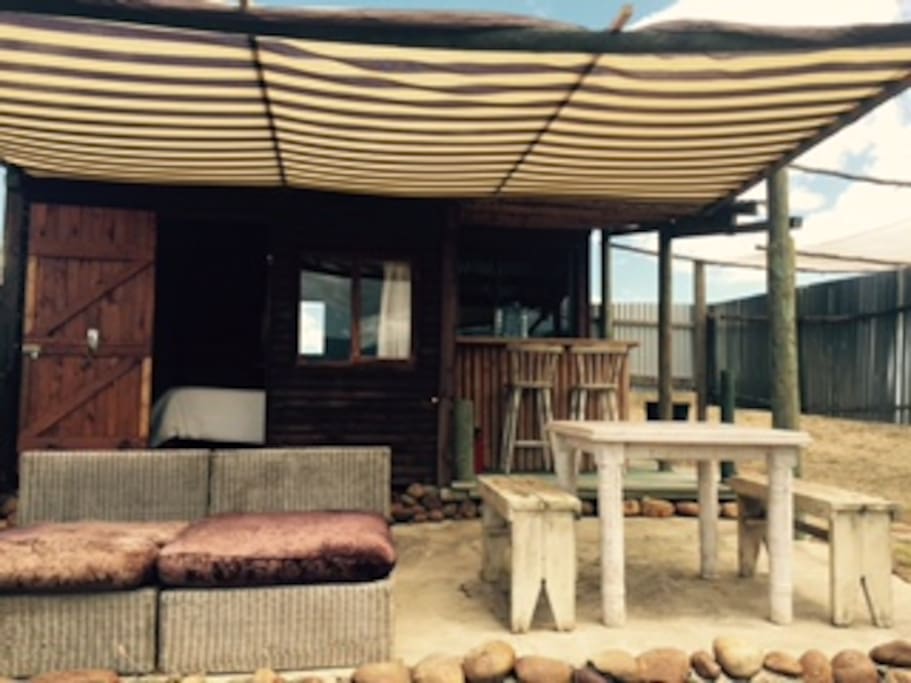 Deck, barbeque area and outside kitchenette at the cottage