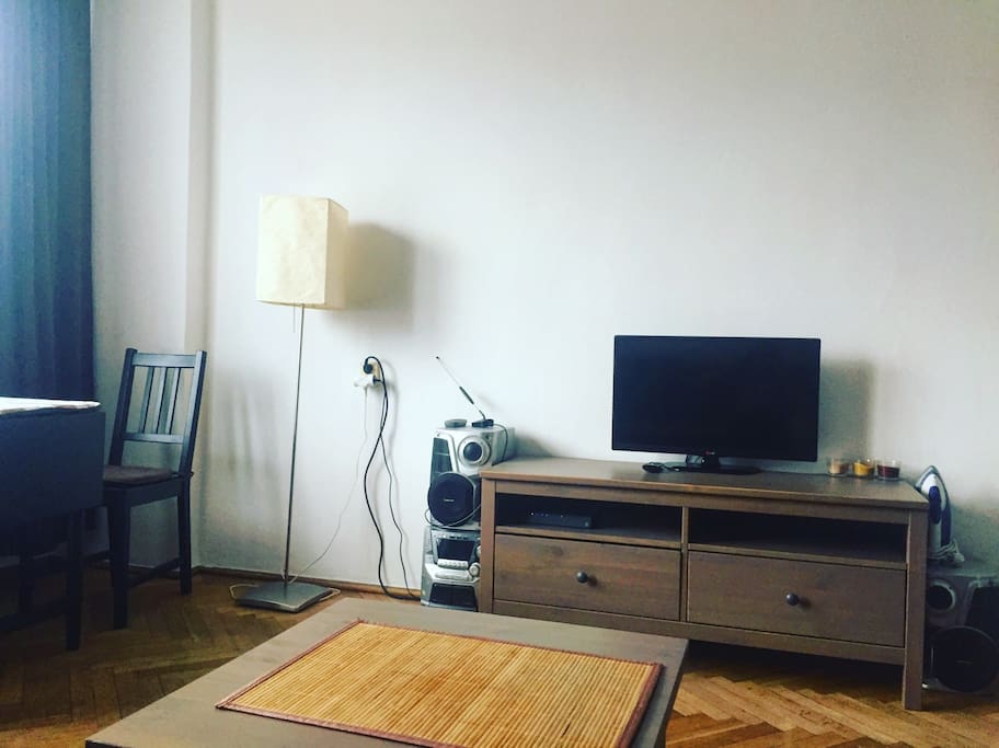 Private room with TV, table and workspace