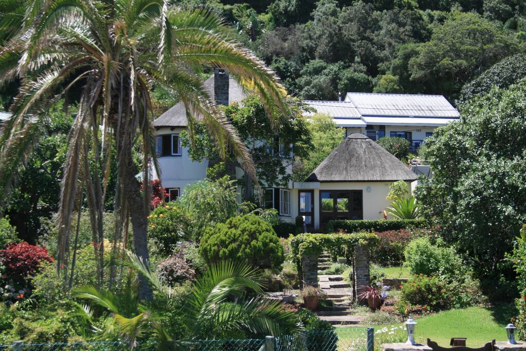 Closer shot of the main house and cottage