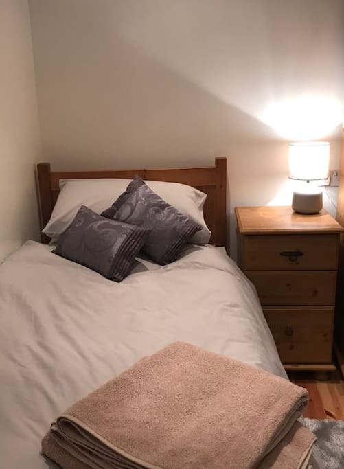 Full size single pull out mattress under neath single bed, with sturdy stands so is same level as single bed to create a comfy double if required.