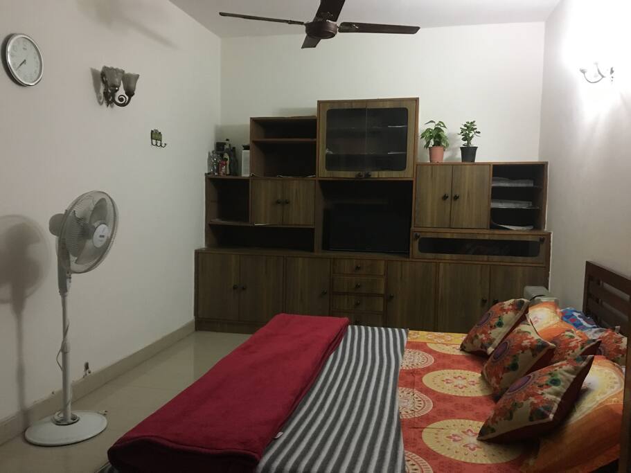 A queen bed and plenty of storage.
