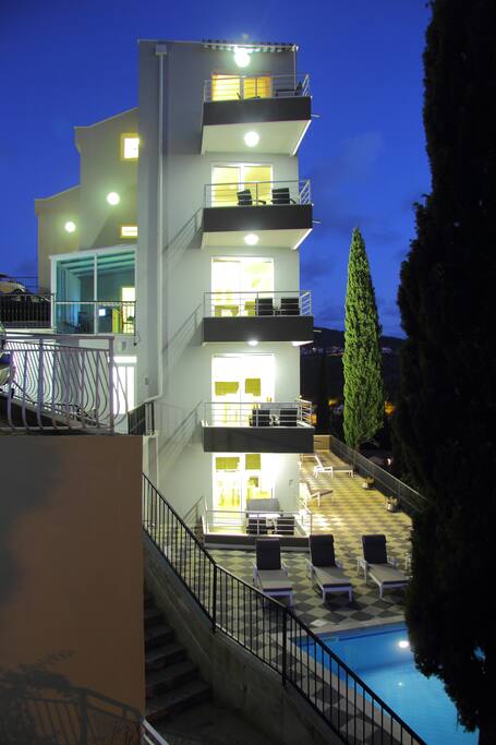 House & Pool by night