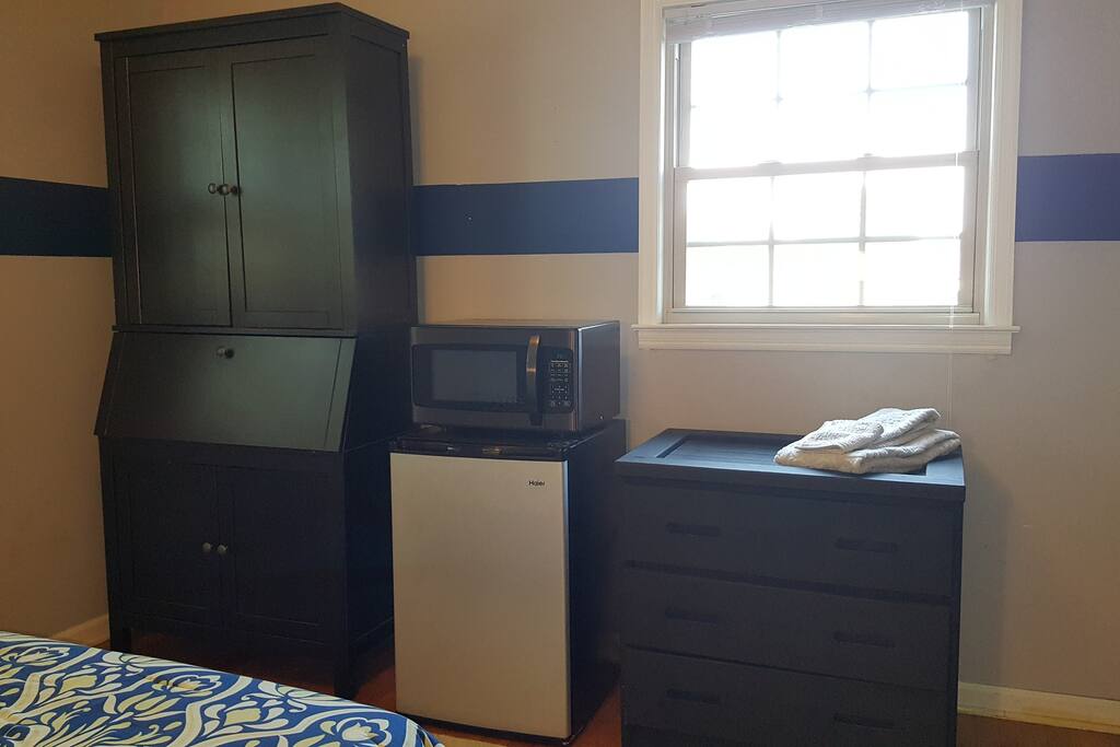 Desk, dresser, microwave and mini -fridge