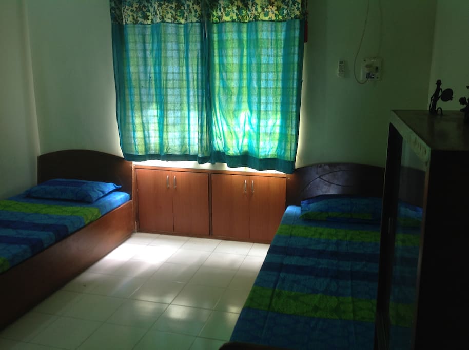 Bedroom with two single beds - they also can be joined!