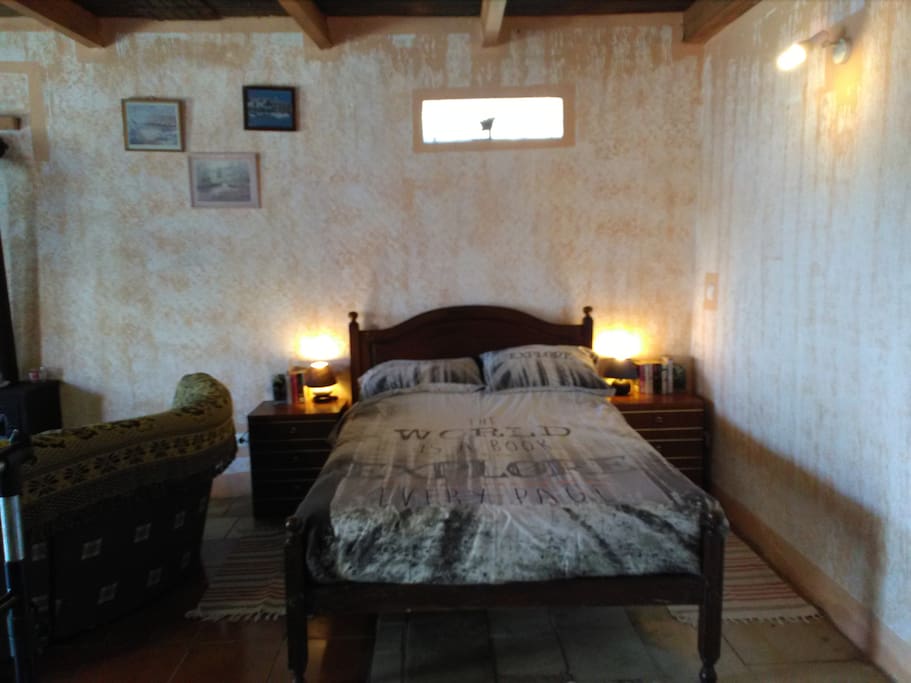 Double bed, notice the window over it does not have a curtain.