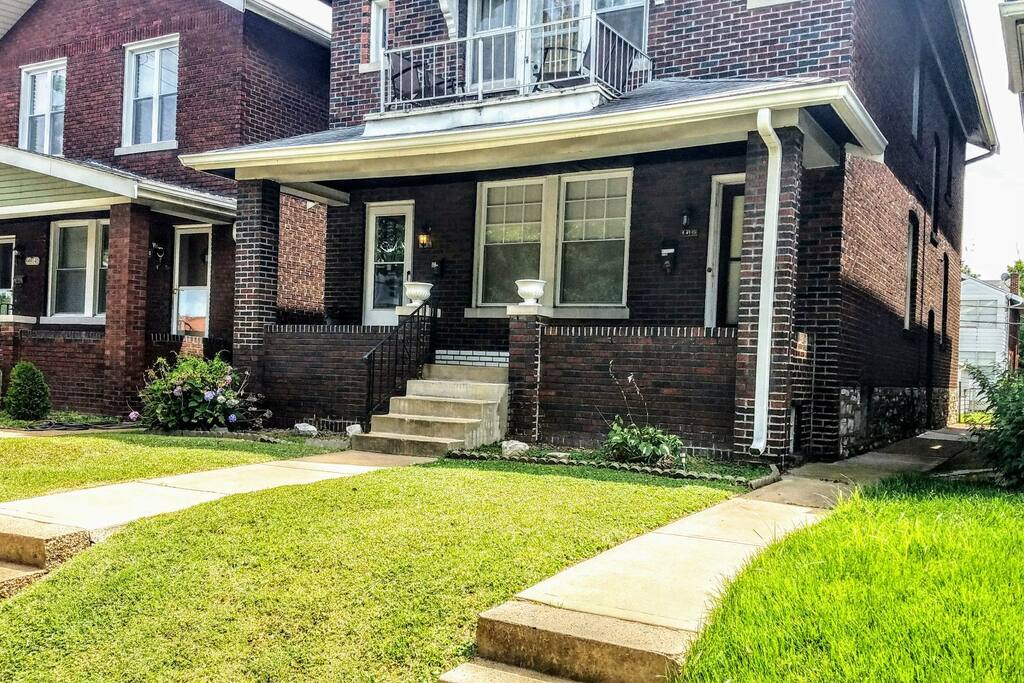 Exterior of building: The Southtown Suite is accessible through the left (east) door on the porch.