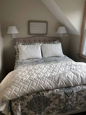 Comfortable bedroom with double bed, bunk beds and large closet