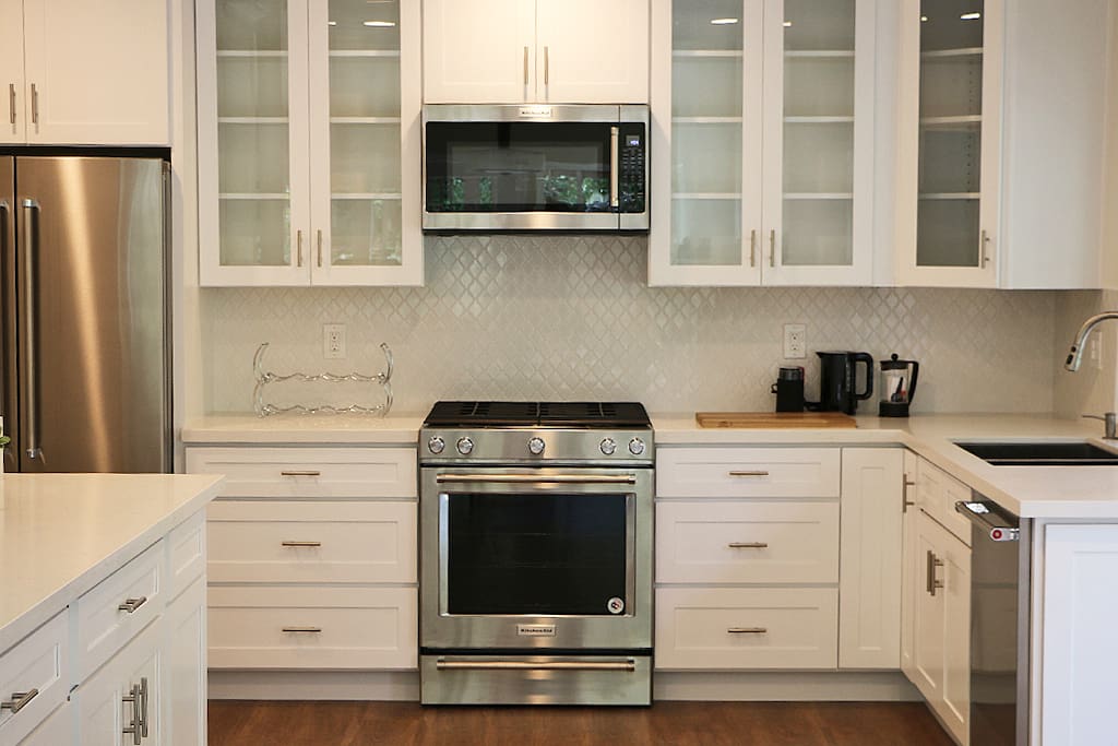 Beautiful new kitchen with gas stove.