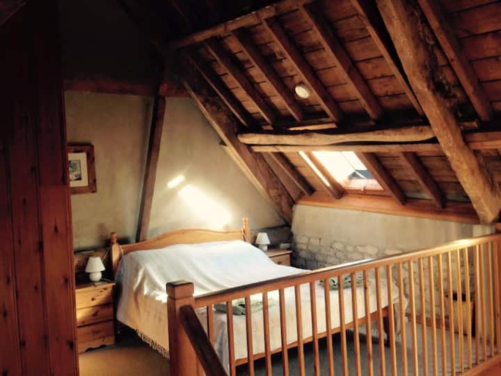 Vaulted Wooden-Beamed Ceilings of the 2nd bedroom