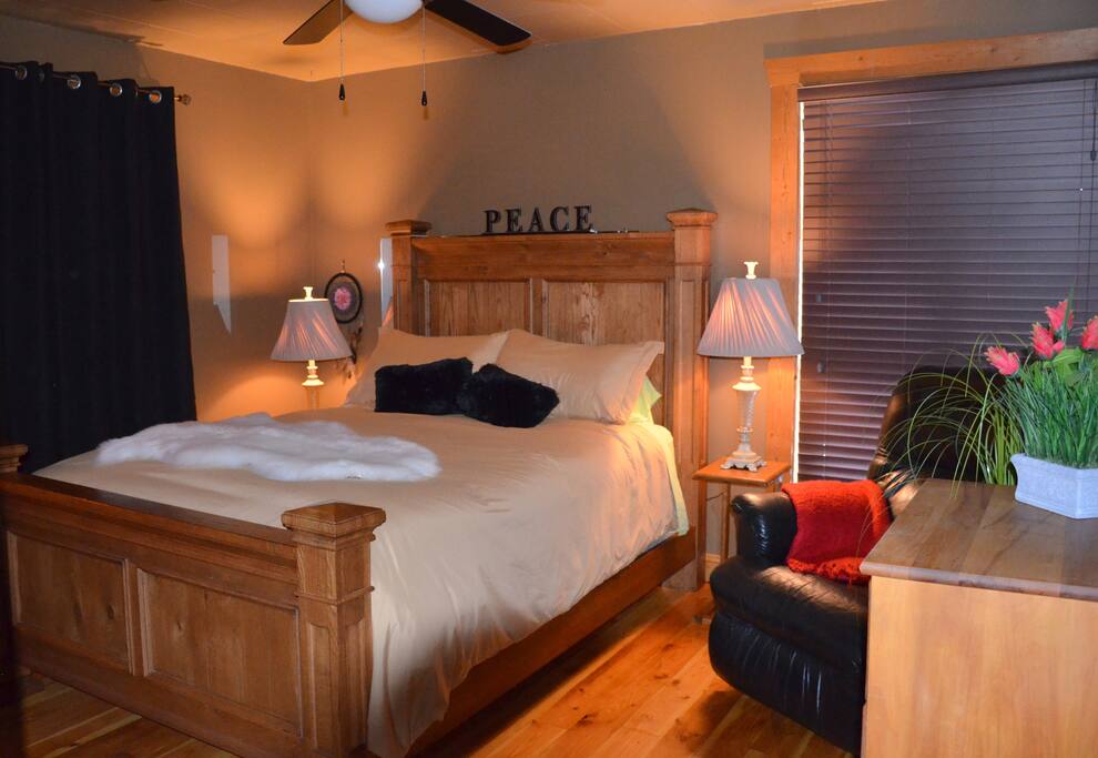 New Queen Bed! Very Comfortable. Feather Douvet feels like heaven. Cozy pillows Leather Reclining Chair, Dresser Mirror...