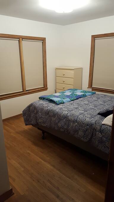 Bedroom with queen bed.