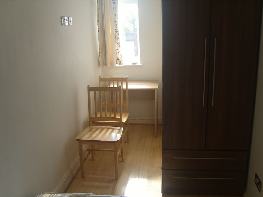 Wardrobe, desk and chair