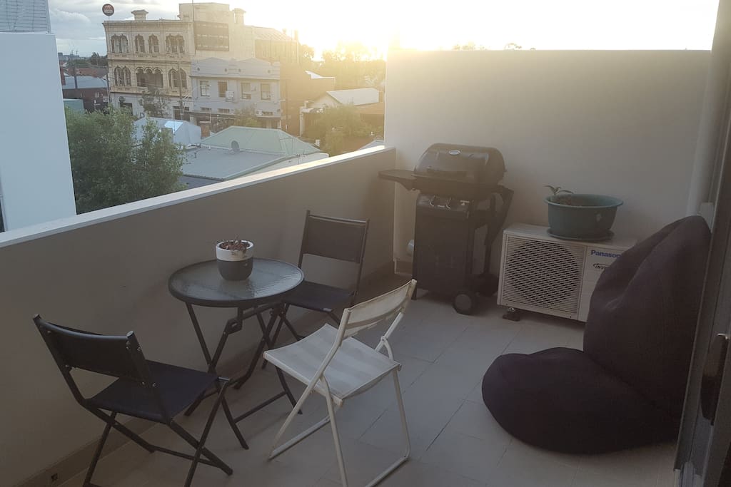 Balcony, outdoor setting & BBQ.