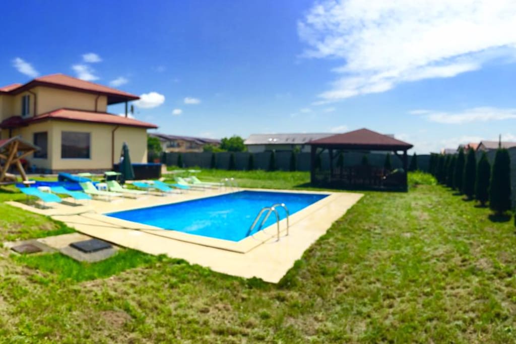 outdoor pool jacuzzi and foyer