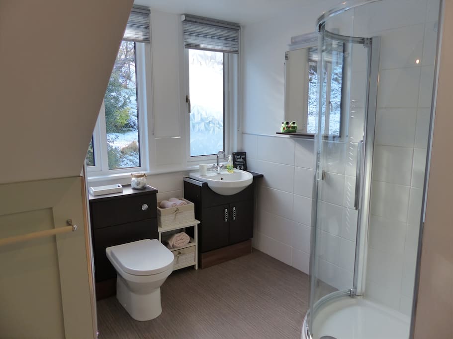Rain head power shower in your en-suite.