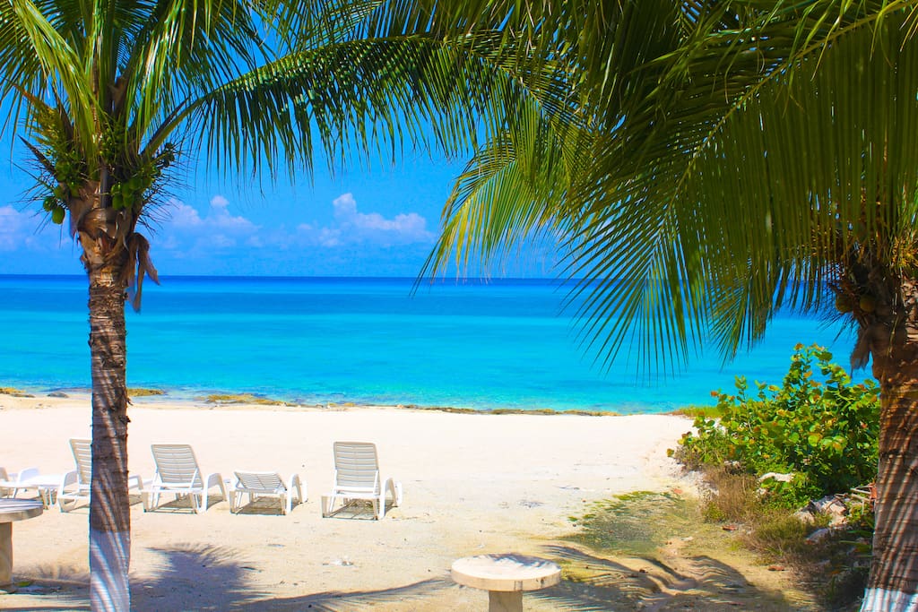 Beautiful quiet, private walk out beach with lounge chairs