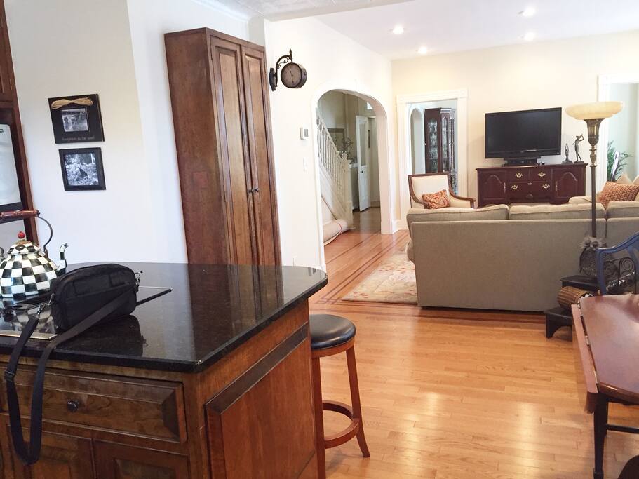 Additional view of kitchen and TV room.