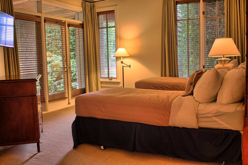 Enjoy a movie from the comfortable twin beds