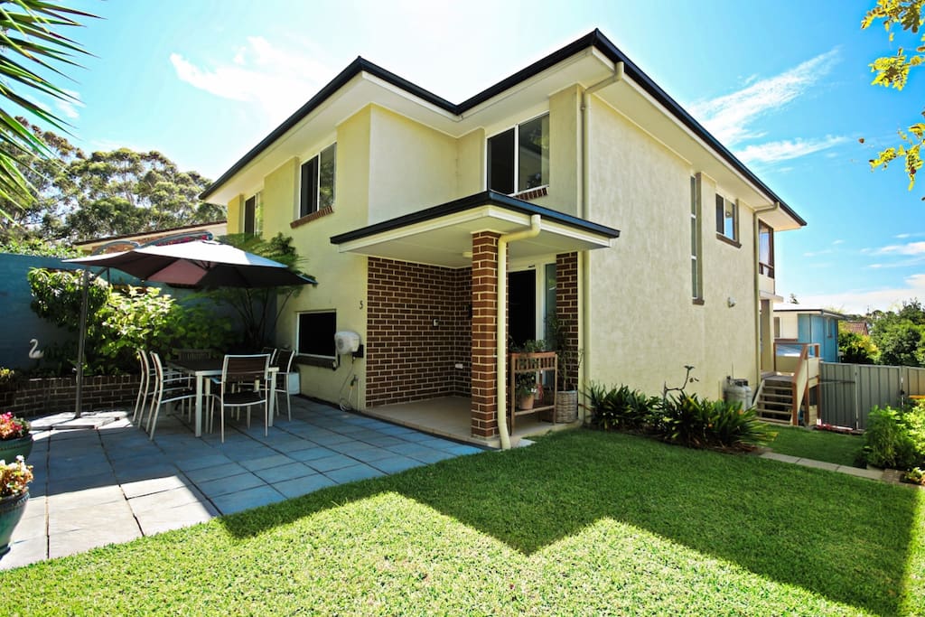 Fully fenced well maintained garden with outdoor entertaining area