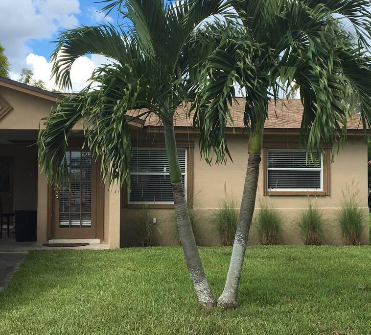 Outside of the house, carport to the left
