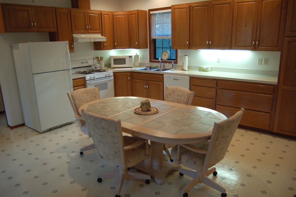 Full kitchen area with gas stove, microwave, refrigerator, dishwasher, etc.