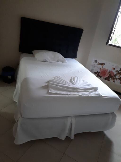 Quarto suíte cama de casal