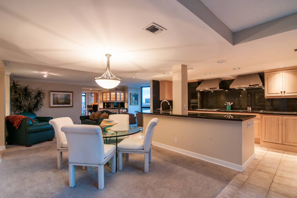 The stunning kitchen table is the perfect place to gather with guests.