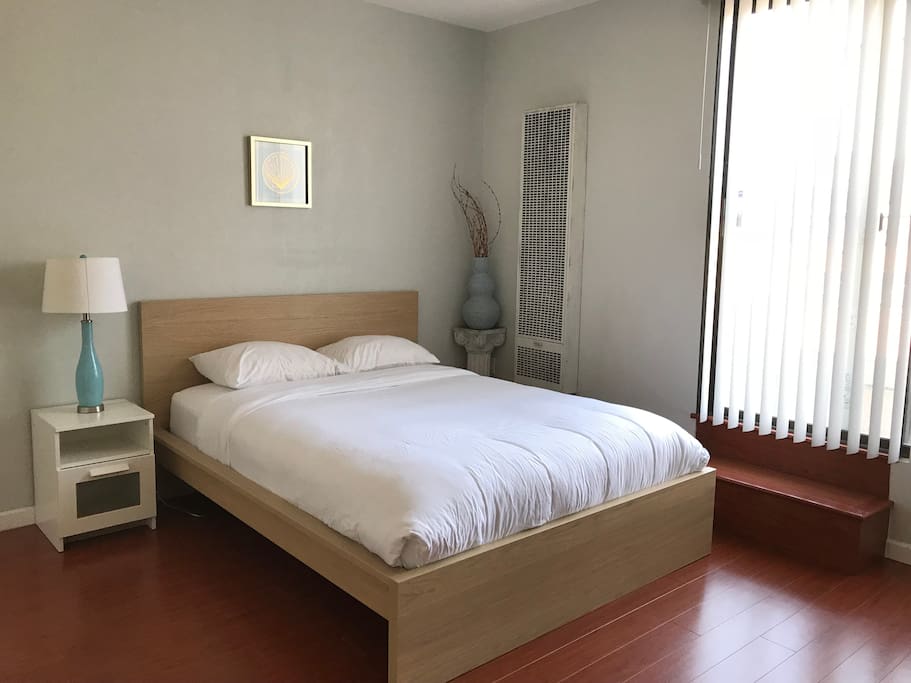 Bedroom 1 - includes 1 queen bed, TV (no cable but has Amazon Fire TV), desk, attached bathroom