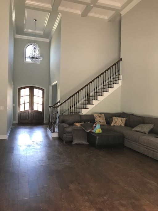 Downstairs living room (view to your private area : upstairs living room and three bedrooms/two bathrooms)