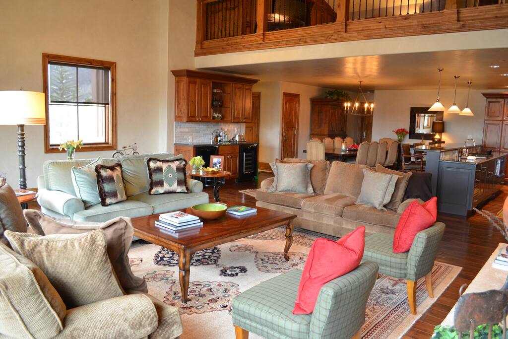 The open floor plan allows the space needed for entertaining and social gatherings flowing from the kitchen to the living room into the dining room.