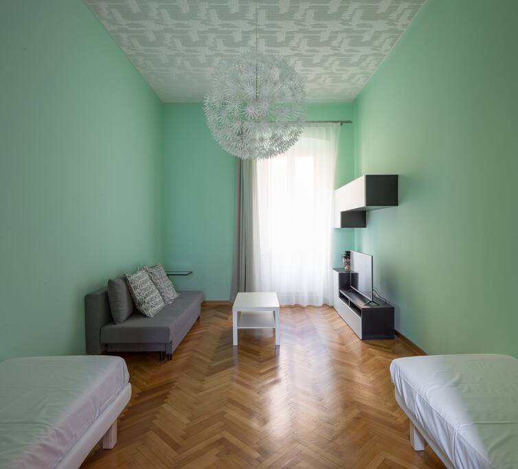 ROOM WITH 2 SINGLE BEDS + A DOUBLE SOFA BED