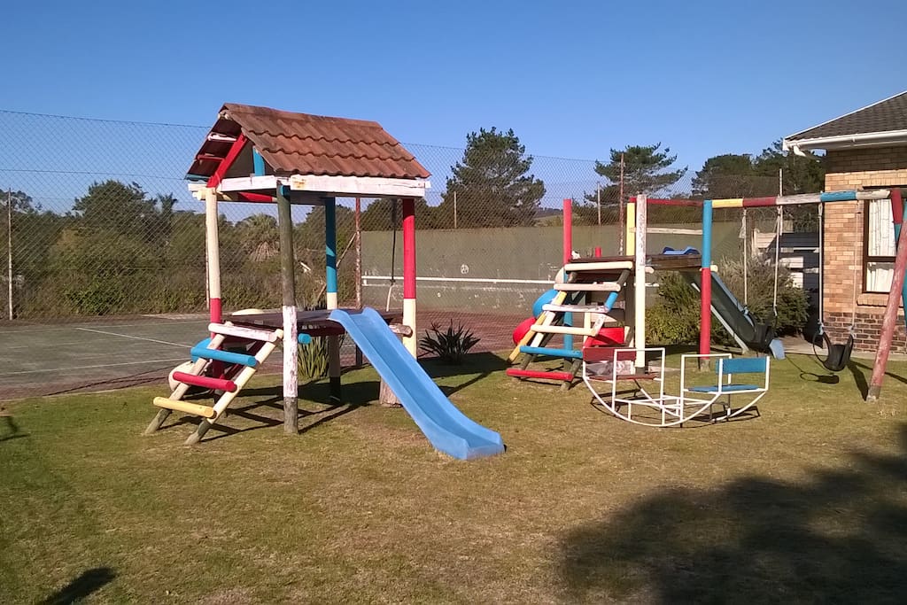 Jungle gym and tennis court