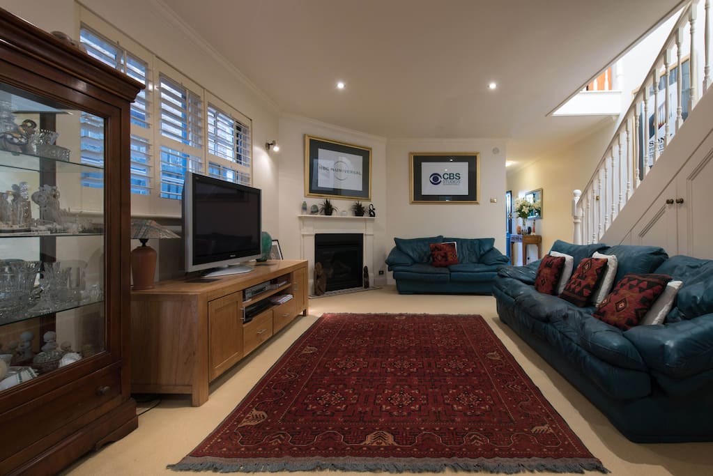 Large TV with a gas fire for your comfort.