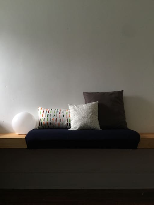 Another photo of the comfy seating and your bedside lamp.