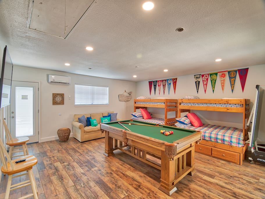 New Bunk Room with 2 twin over full bunk beds, sleeper sofa, 65 in smart tv, pool table, ping-pong
