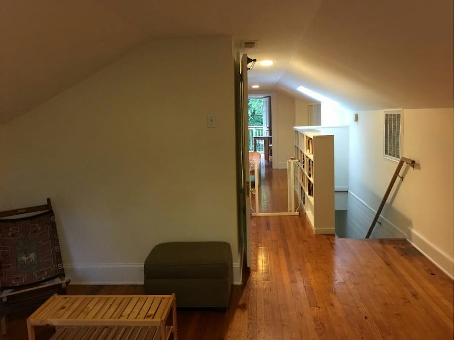 Bathroom on the left, bedroom next to that, kitchenette near the entrance.