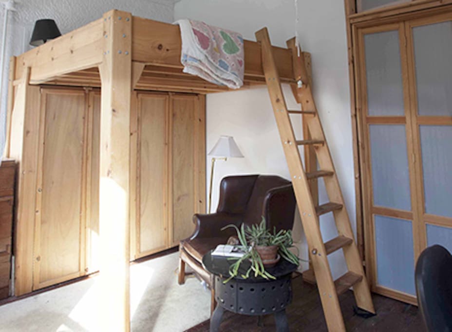 Large Room Loft Bed and Seating Area Below. There is a loft layout at the end of the photo series.