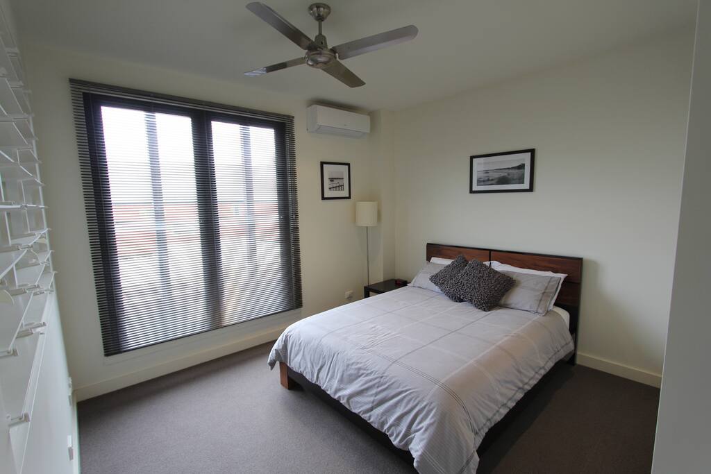 Guest room with queen bed.