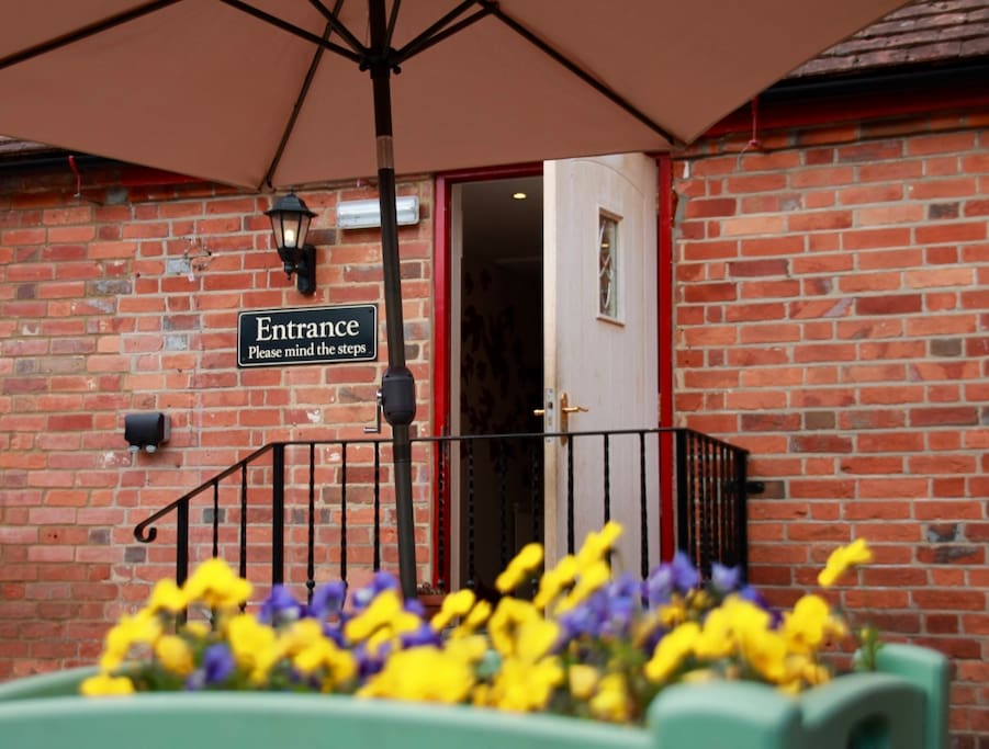 Our patio provides a sunny alfresco dining area in the summer months